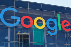 google photo of Google logo on a building