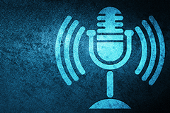 Podcasts graphic representing a live desktop studio microphone